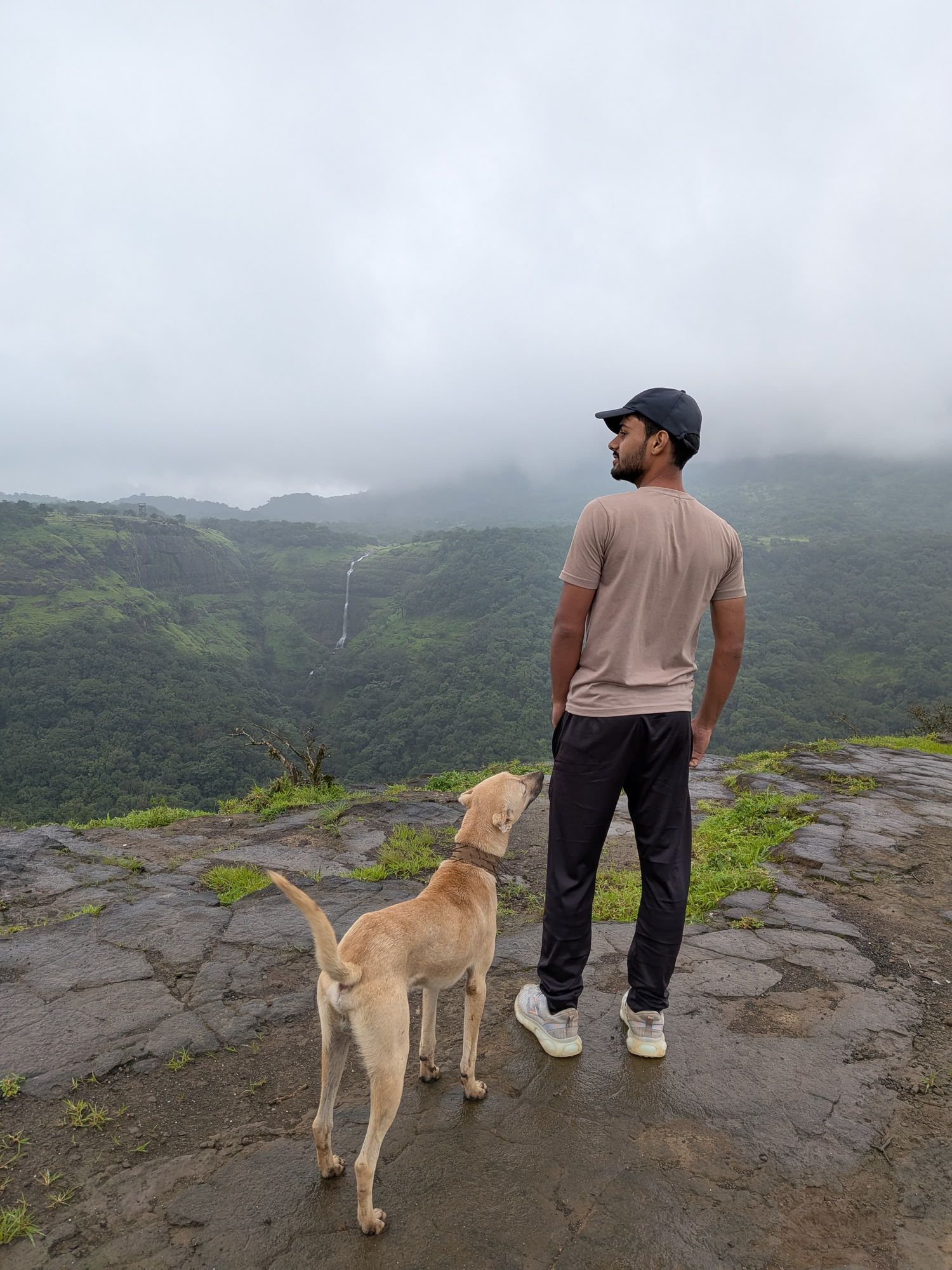 In this photo i am with a dog seeing a beautiful nature view, but my girlfriend is not there i want to she had there so generate my girlfrie...