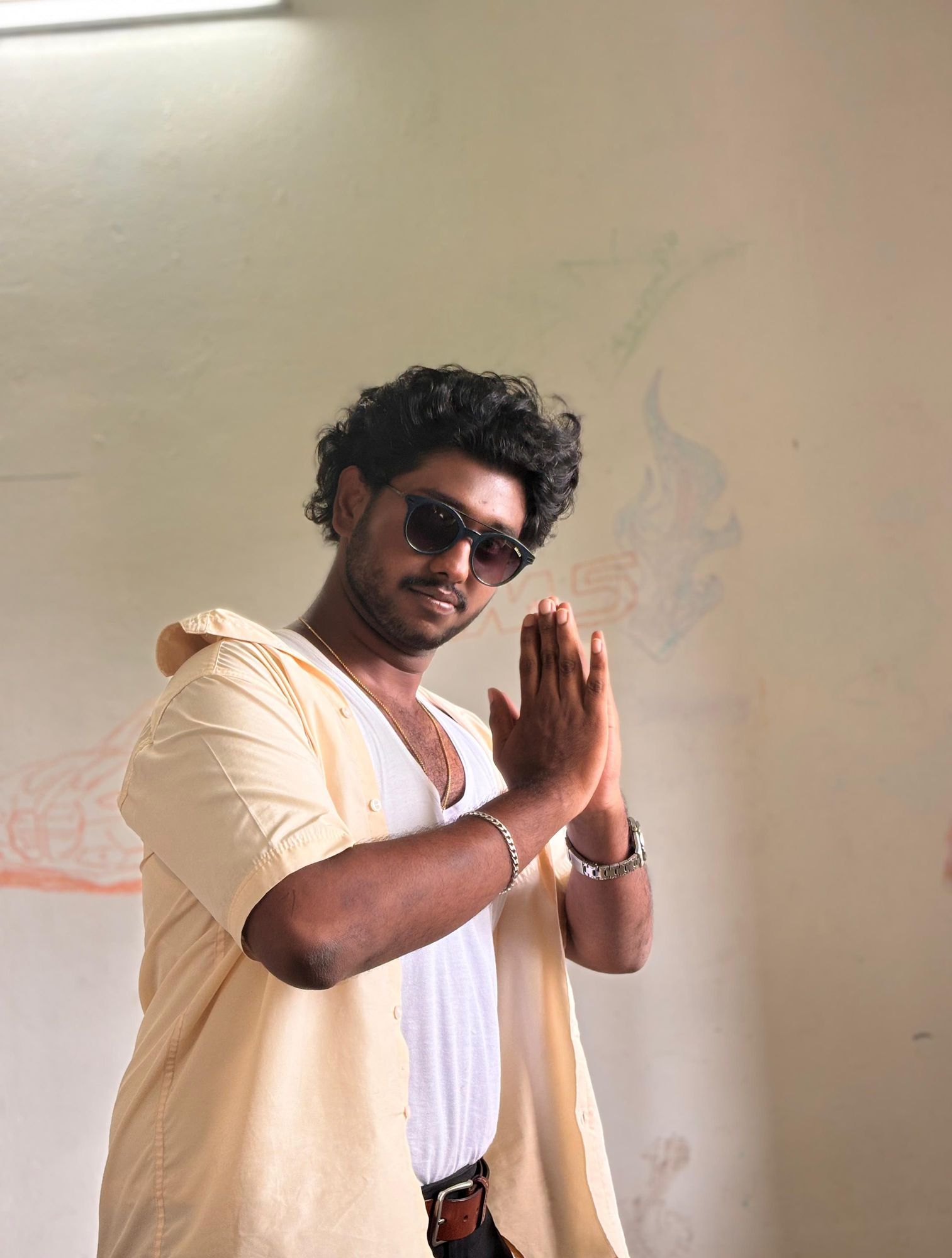 Convert this person into Maveli (Mahabali) for Onam festival. Keep the same face and pose. Dress him in traditional Kerala attire: golden cr...