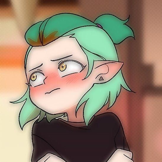 um animal de cor laranja e branco, pequeno e lendo um livro