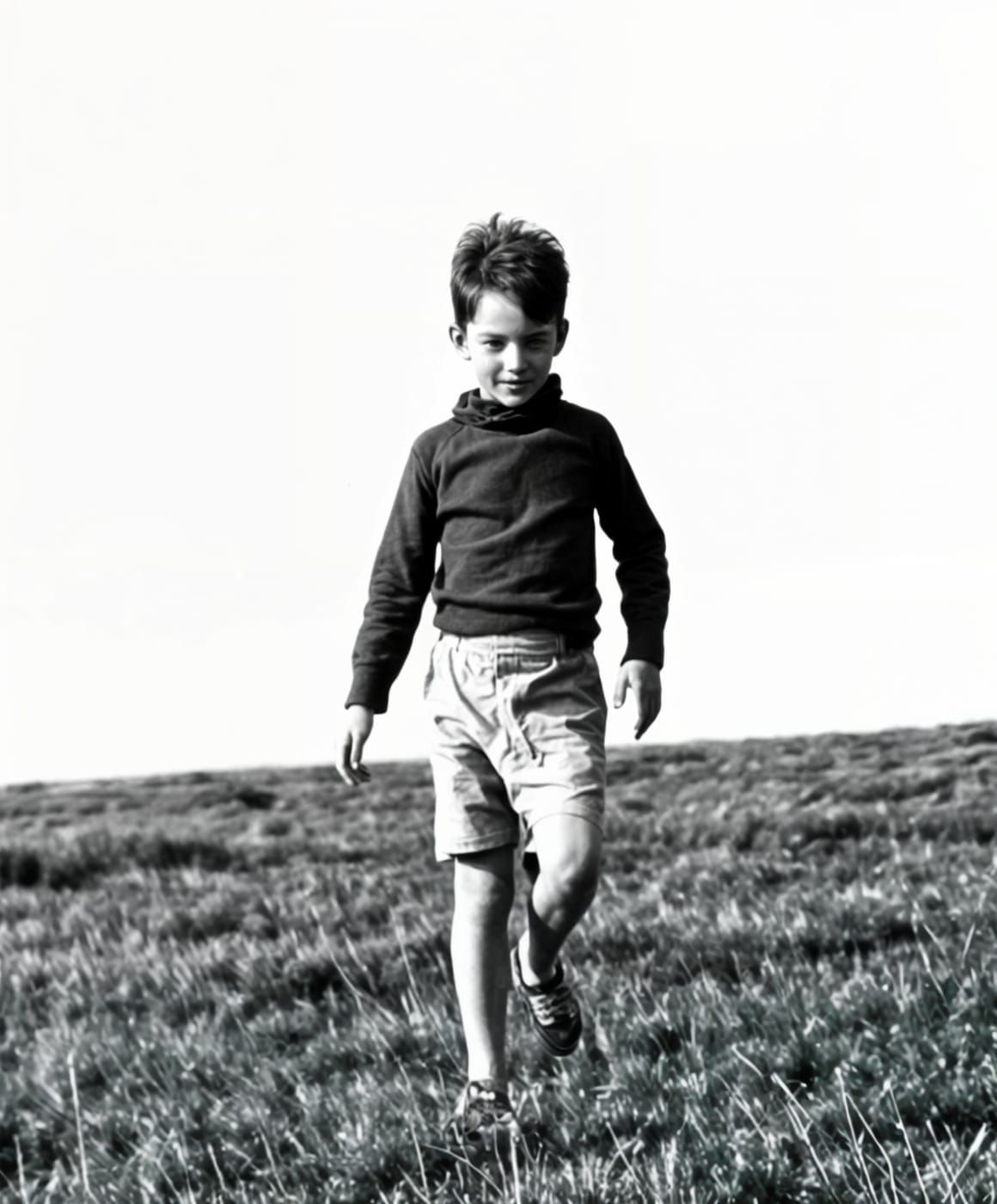 Roger as a child running across the moors.