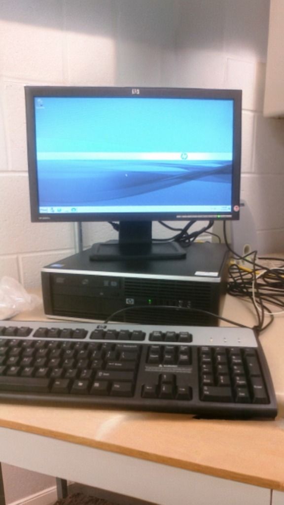 Cozy anime style. The vibe is nostalgic. Computer and desk are set up in an American middle school boys bedroom. It is night time.
