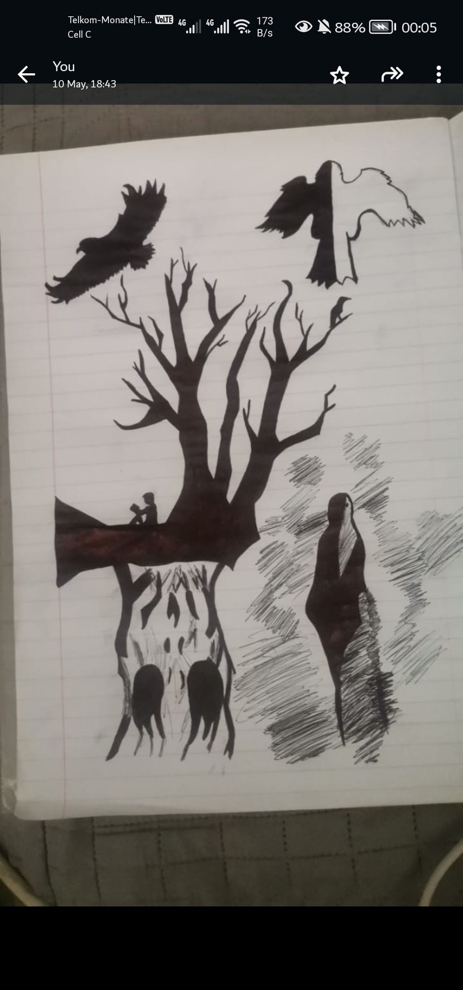 A boy sitting sitting on a tree reading the bible while the demons are trying to get him. But there is an angel on top watching over him