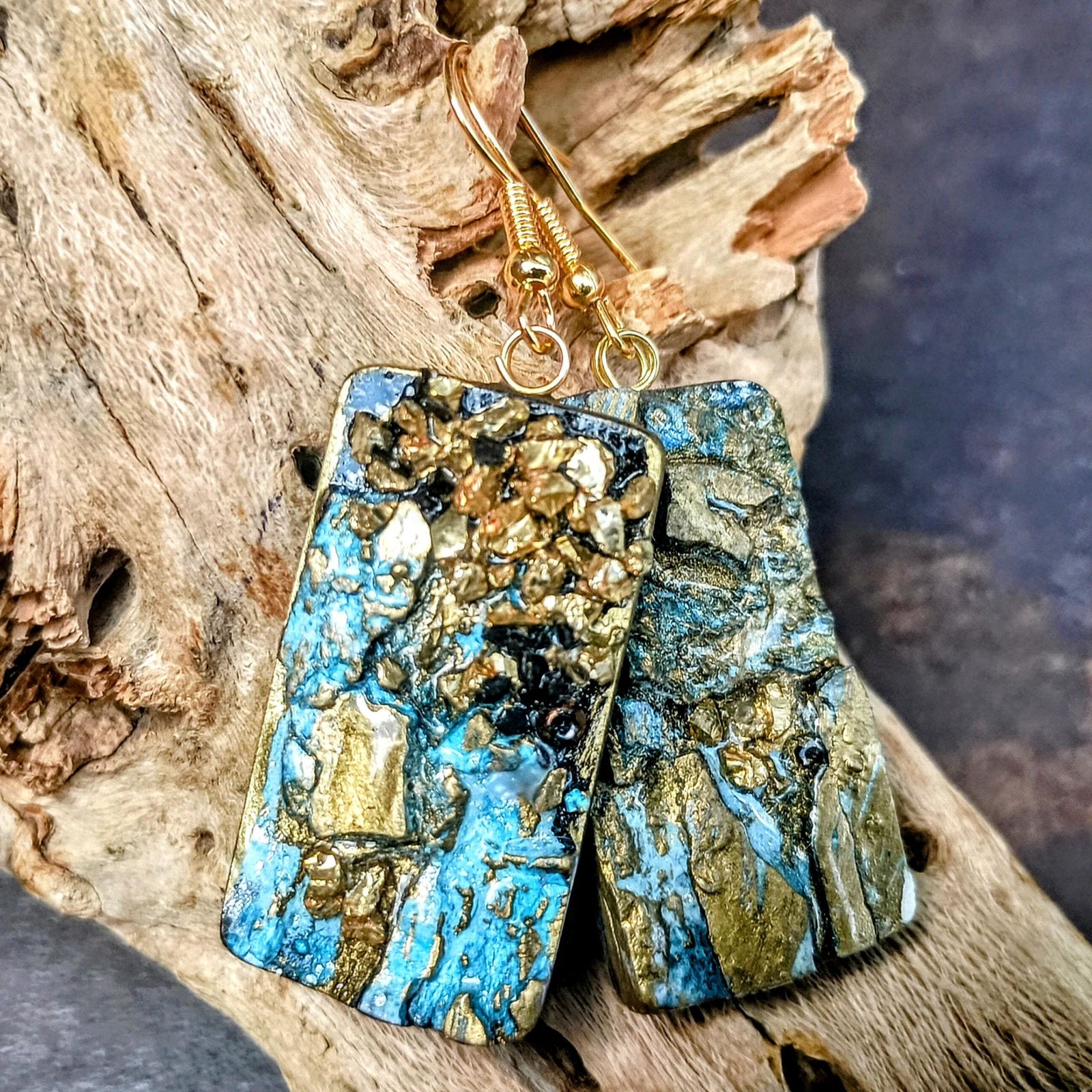 Actual earrings. I made the video using Kling 1.6.