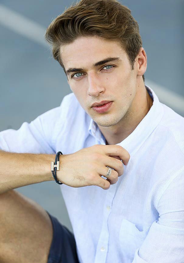 A young man looking at you.