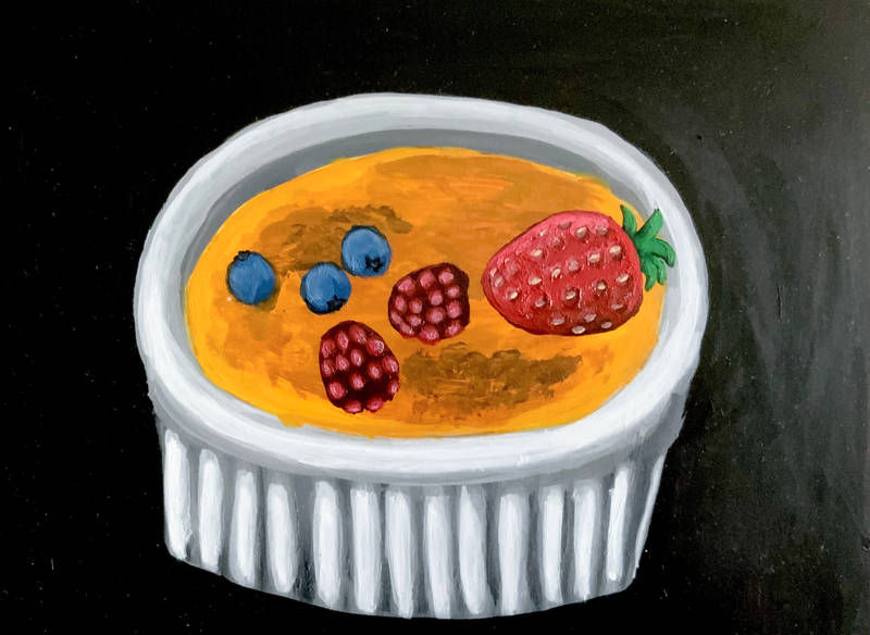 Creme brulee in ramekin, fruit