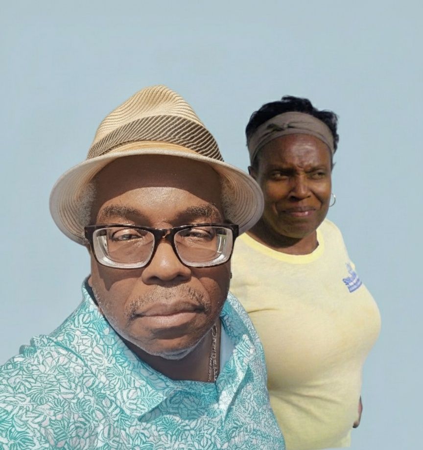A photorealistic studio portrait of a Black couple. The man wears a light-colored fedora with a striped band, glasses, and a blue patterned ...