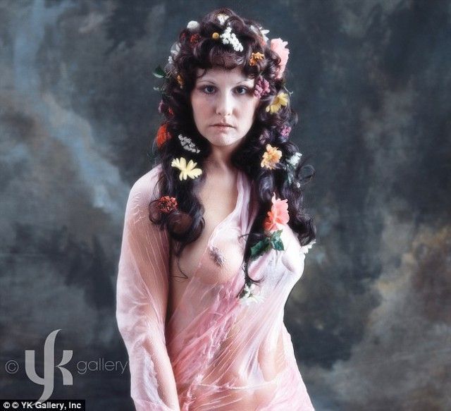 color photo of Anna May Wong in a hippy dress