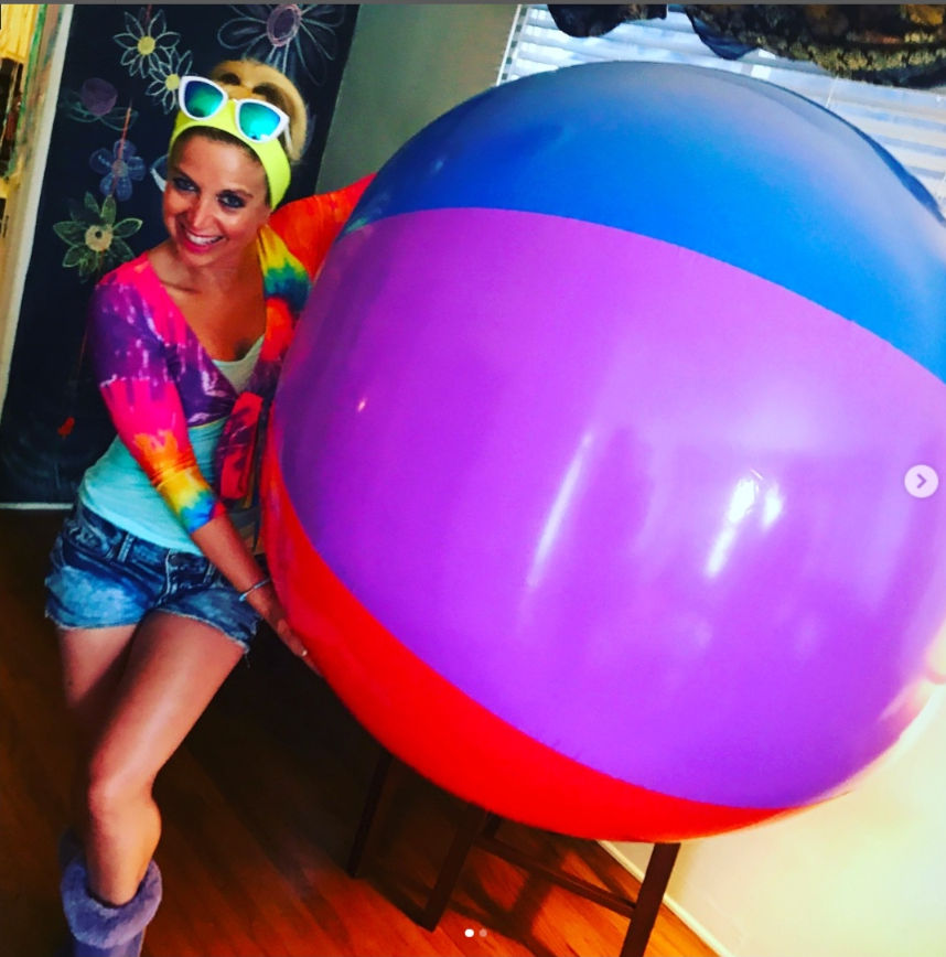 Poison Ivy (Batman) with a jumbo beach ball. fantasy Marvel Comics watermark out of frame cut off bad anatomy cut off out of frame out of fr...