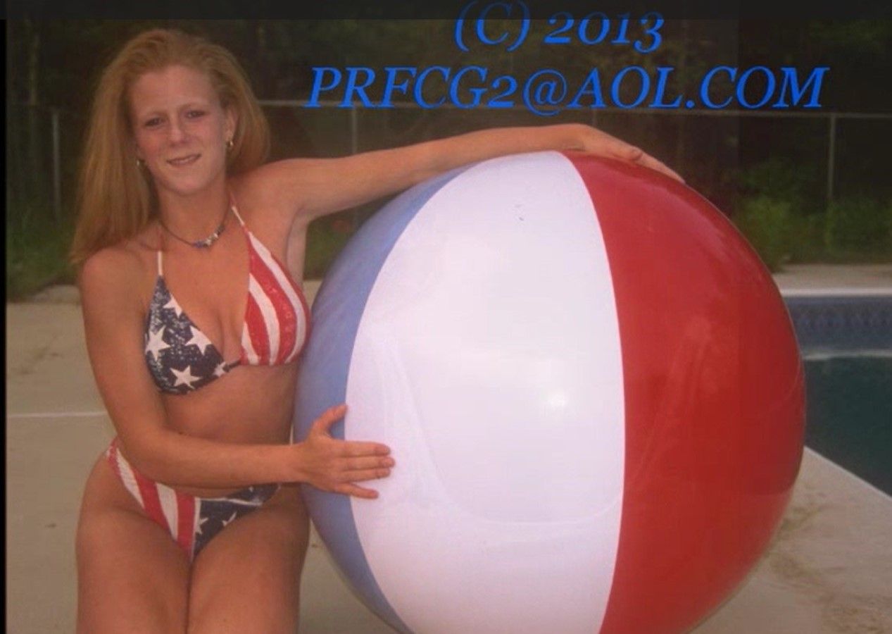 Claudia Christian holding a jumbo beach ball. Kodak Ektar blurred poorly drawn hands poorly drawn face ugly deformed disfigured extra limbs...
