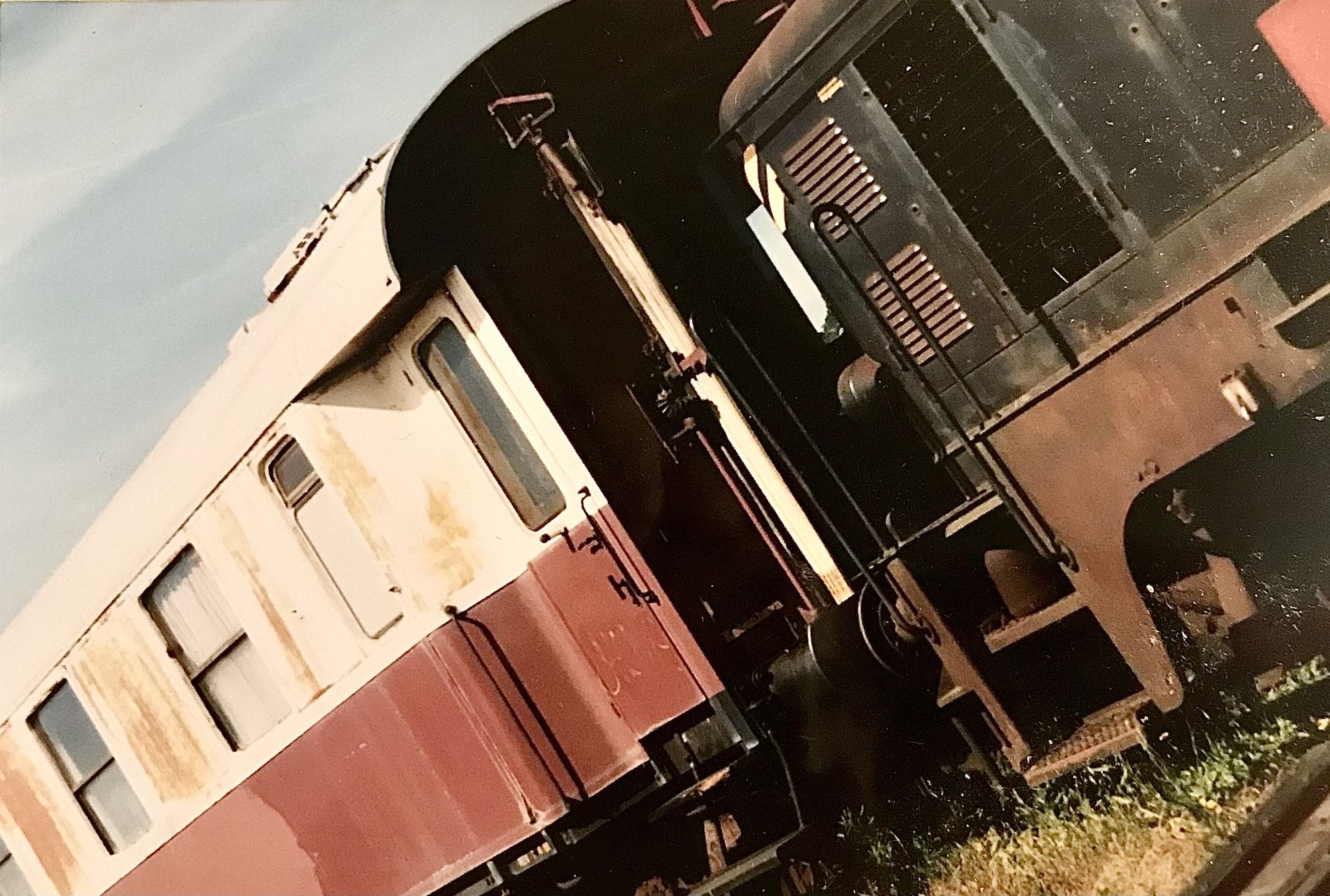 A rusty wreck of a decaying train abandoned ion its tracks in the style of a detailed gouache on paper with ink lines and outines