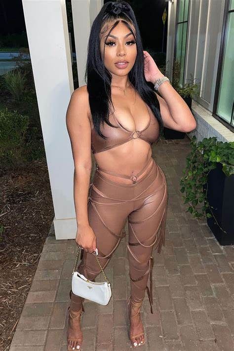 Pretty Hispanic girl, hyper detailed eyes, false eyelashes, lipliner, lipstick, bronzer, detailed pupils, high cheekbones, gorgeous face, th...