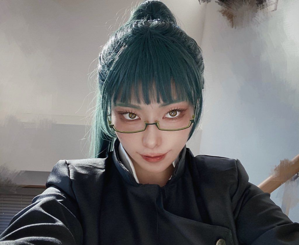 beautiful muscle woman model, tanned skin, short straight hair, green eyes, wearing an Aztec feather headdress, with a halo of holiness, dre...