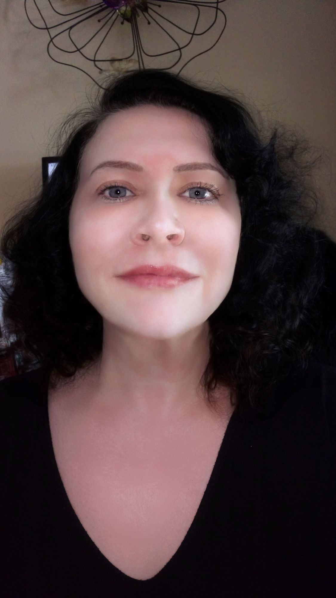 Stunningly beautiful indigo-eyed enigmatic cat Mother with her  single black cat