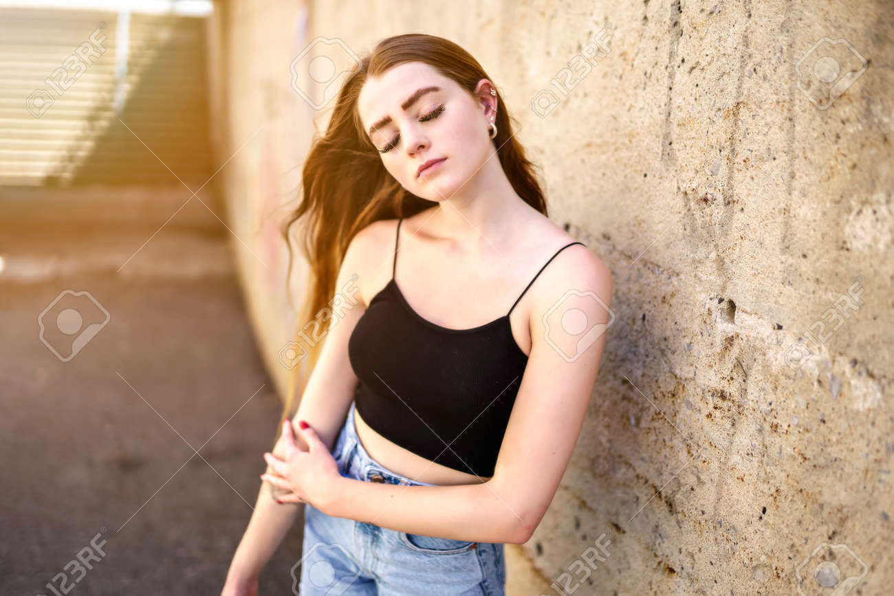 Keira Knightley ultrarealistic face, super detailed ultrarealistic, Dark hair, ultrarealistic superdetailled white shirt and dark-brown leat...