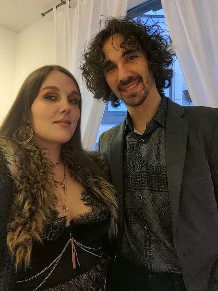 I want you to create us as One Piece characters styled as Luffy and Boa Hancock. Keep some of our characteristics but in that animation styl...