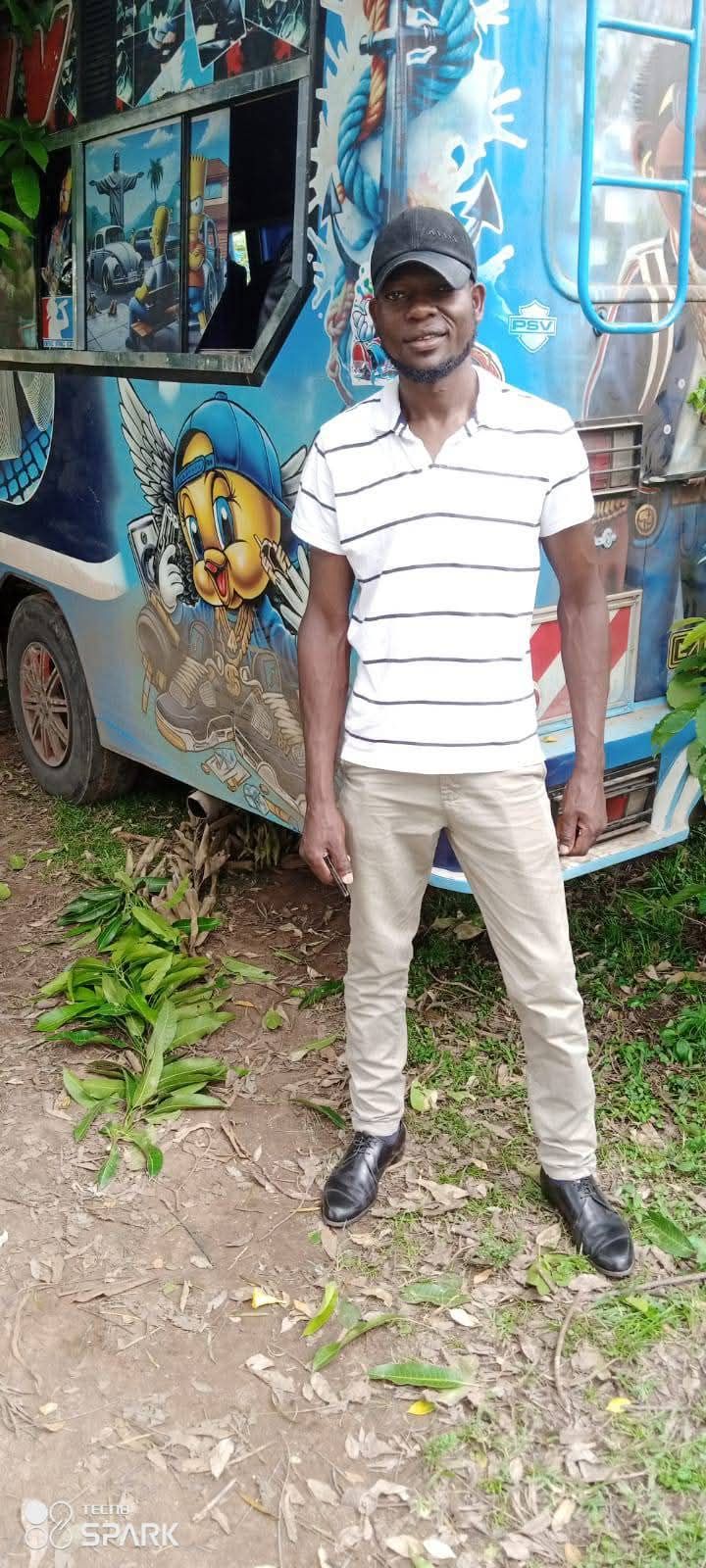 Camera follows man walks to the left onto a sunny  tropical beach