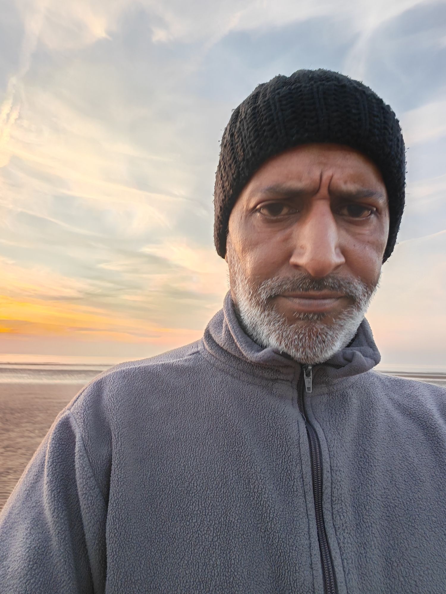 Using the image provided, create an image of a wizard who is casting an ethereal magic spell in one hand and drawing it to the other hand an...