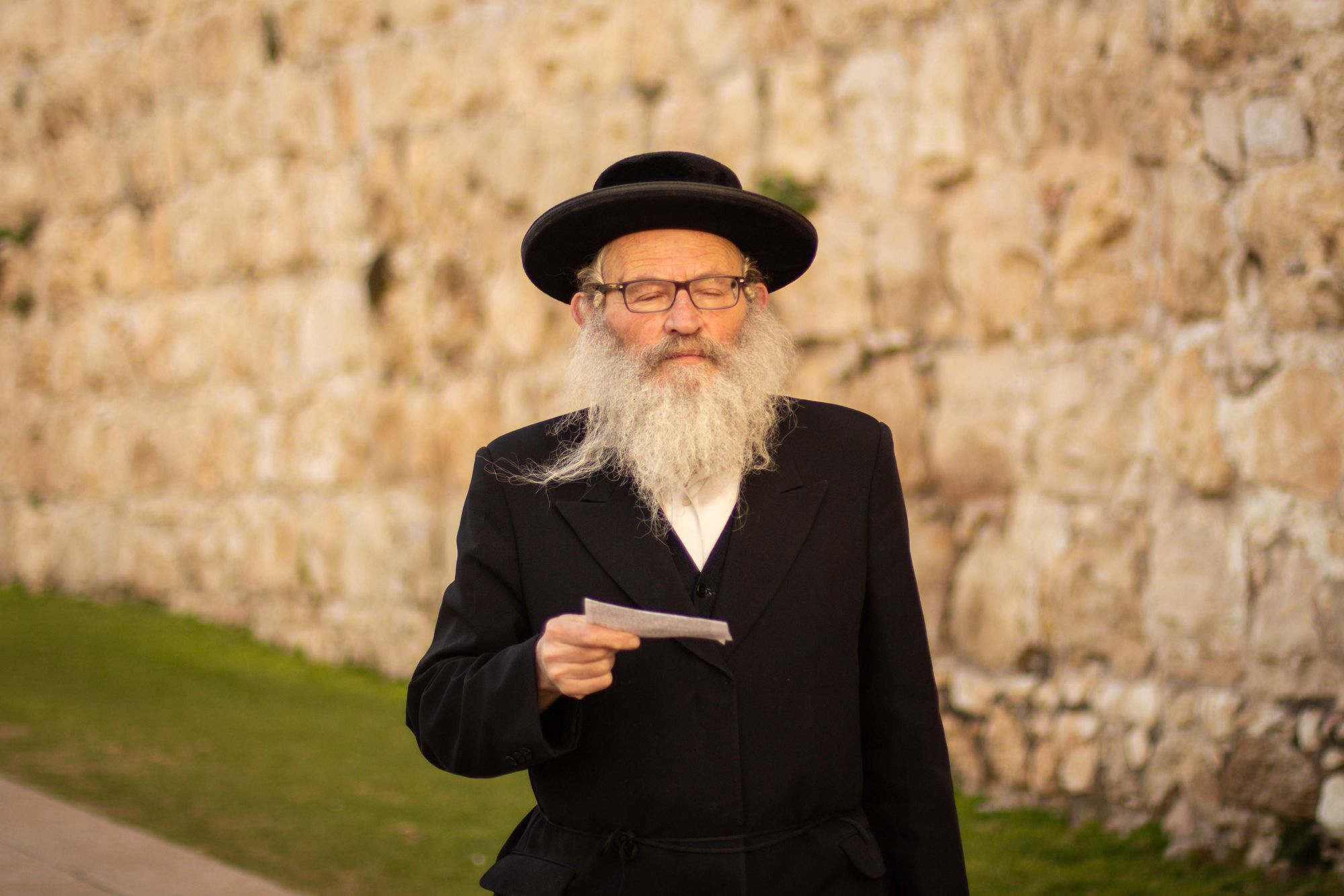  an orthodox Jew in the middle of a prayer