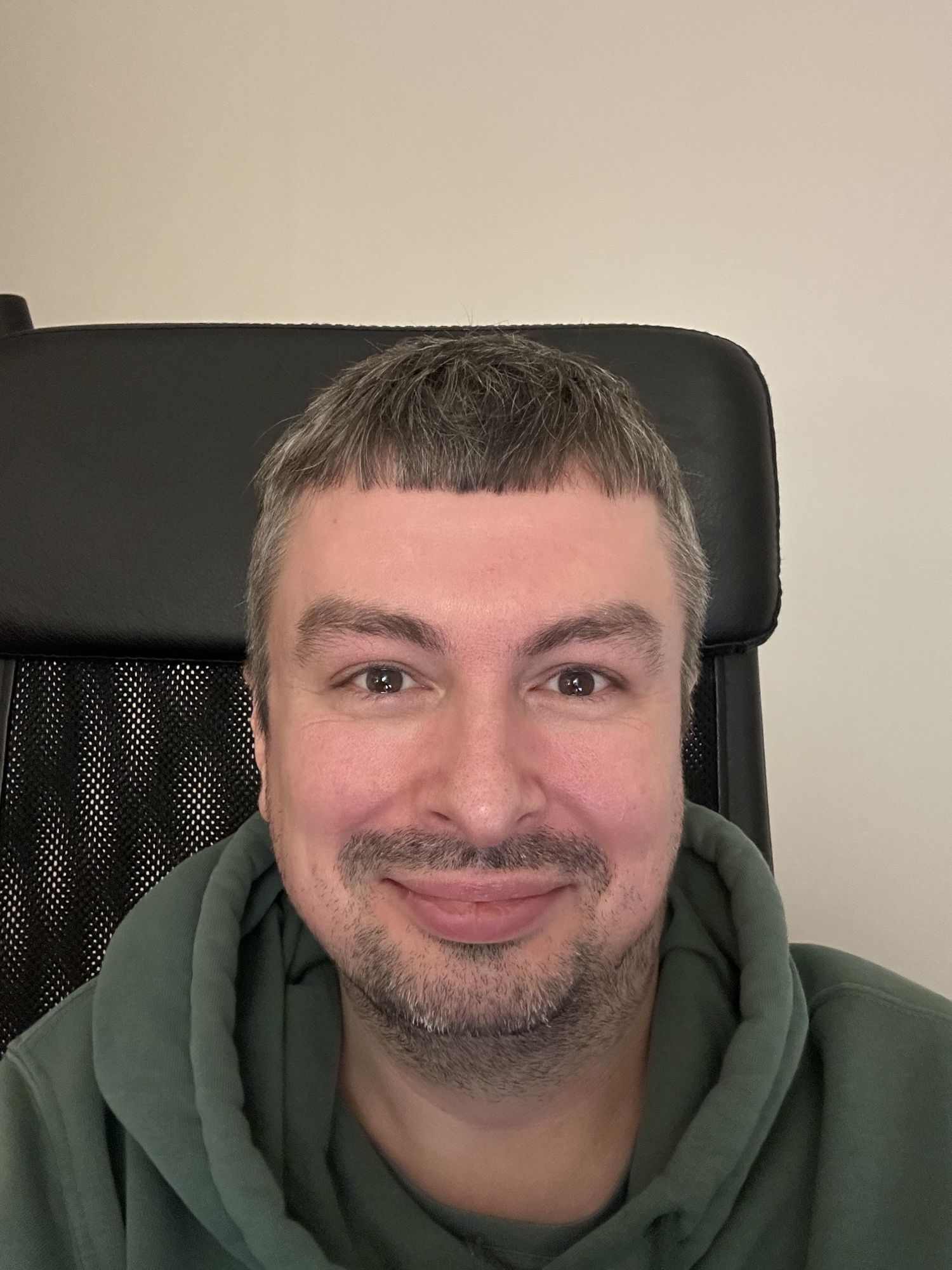 Create a black-and-white Instagram avatar from the uploaded photo. Cinematic, high-quality portrait with warm, soft-light ambience even in m...