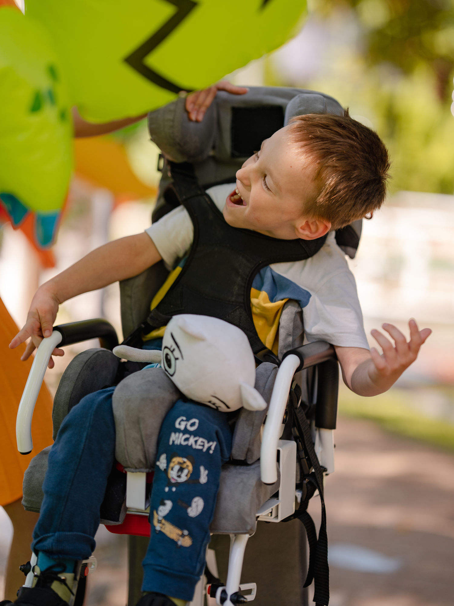 <lora:MakeItPretty:1.0> happy disabled children 