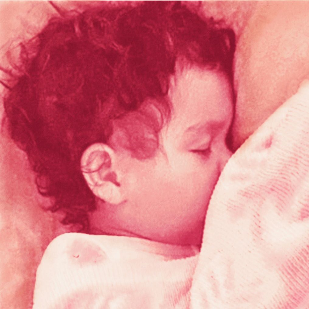 Brush strokes of new life,hope blooms in newborn's portrait blessing with hope's bright light 