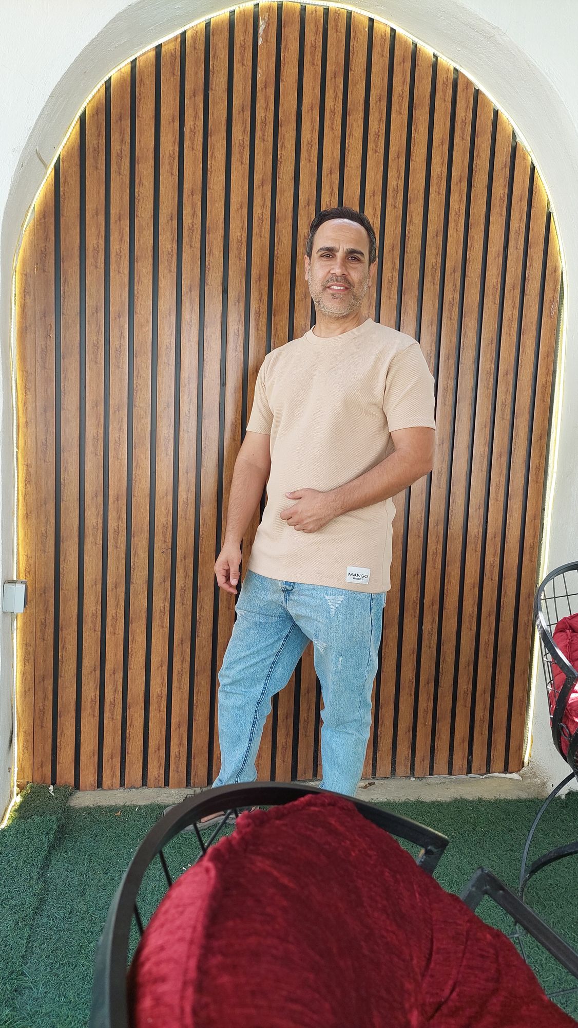 Place the character in the image at a national robotics AI seminar, surrounded by very beautiful and attractive women, with two men listenin...