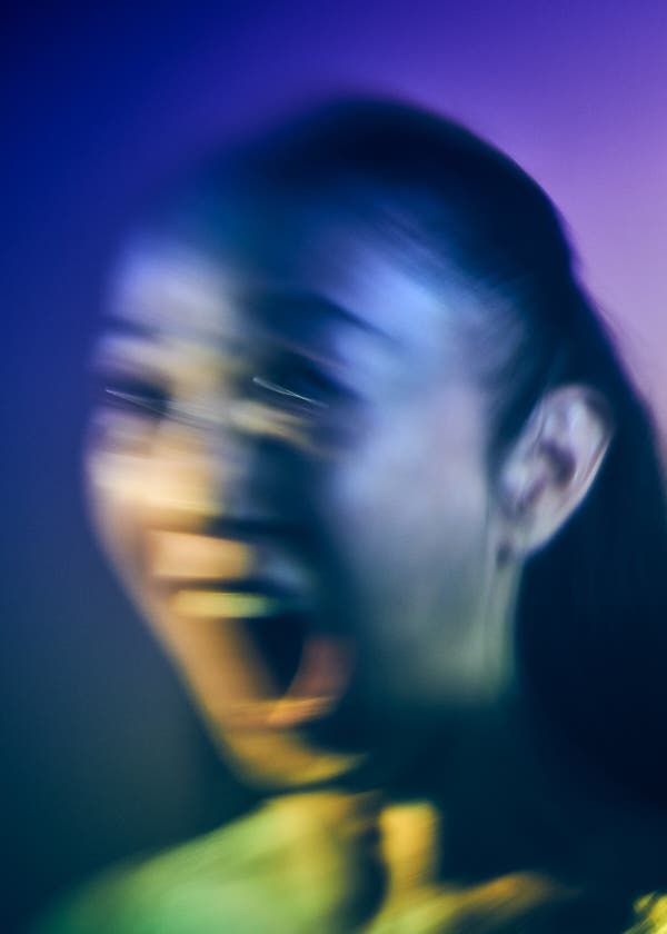 Sade the hair and eyebrow color slightly auburn but leave everything else exactly the same