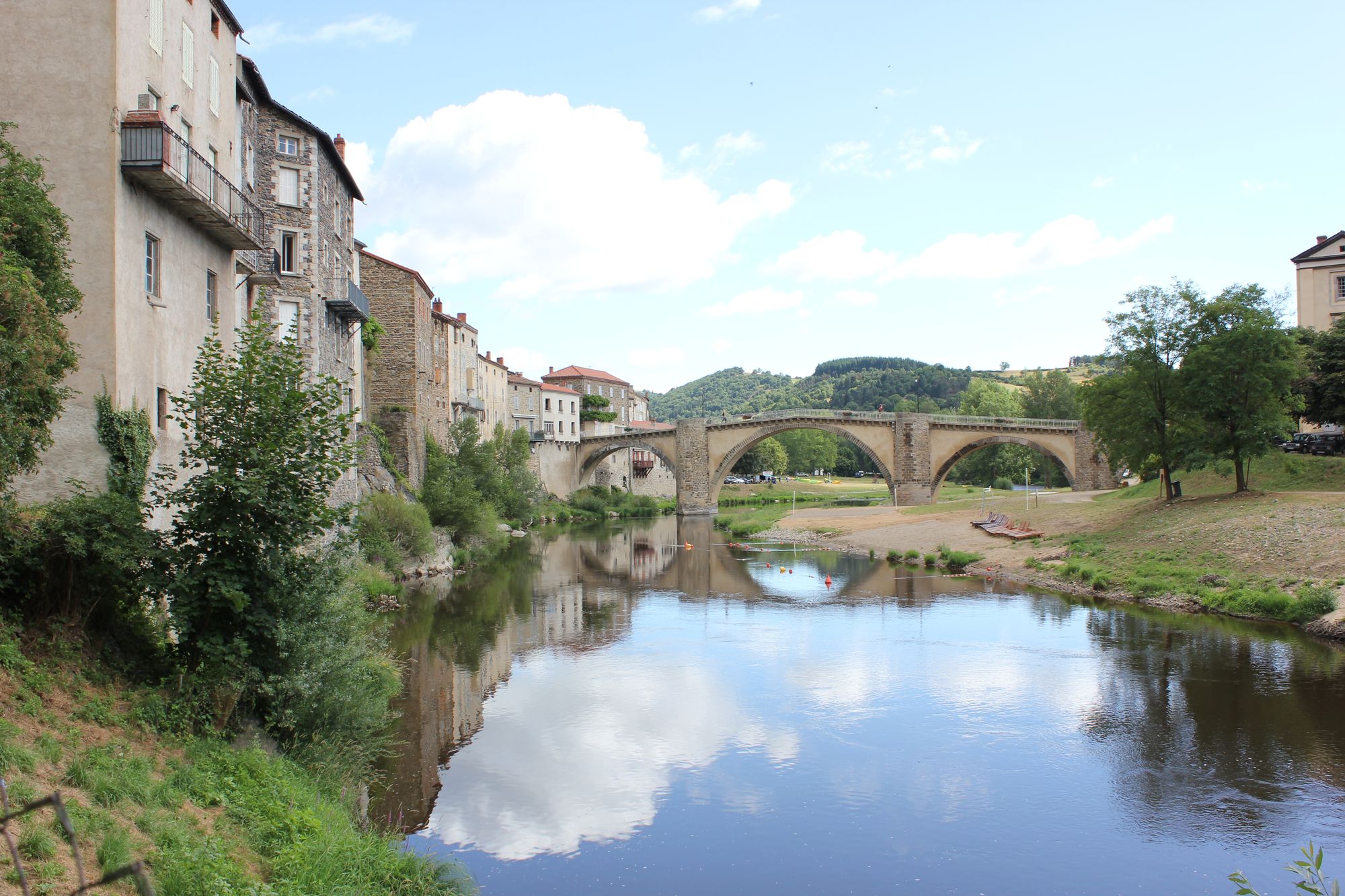 Picture a wonderful landscape in <lora:MrsH Watercolor:1.1> watercolor, with a touch of <lora:Echo of Light:0.8> effects. The theme is a vie...