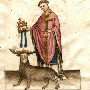 A man gives a tiara to the Deer Wolf man, a wolf with the human head and horns of a deer
