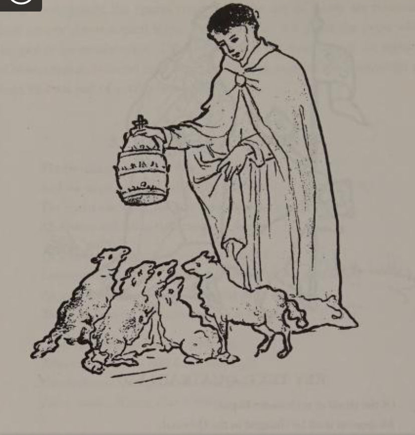 A man passes a tiara to five sheep