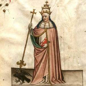 A man with a red book beats a young Black Eagle lying on the floor with his staff