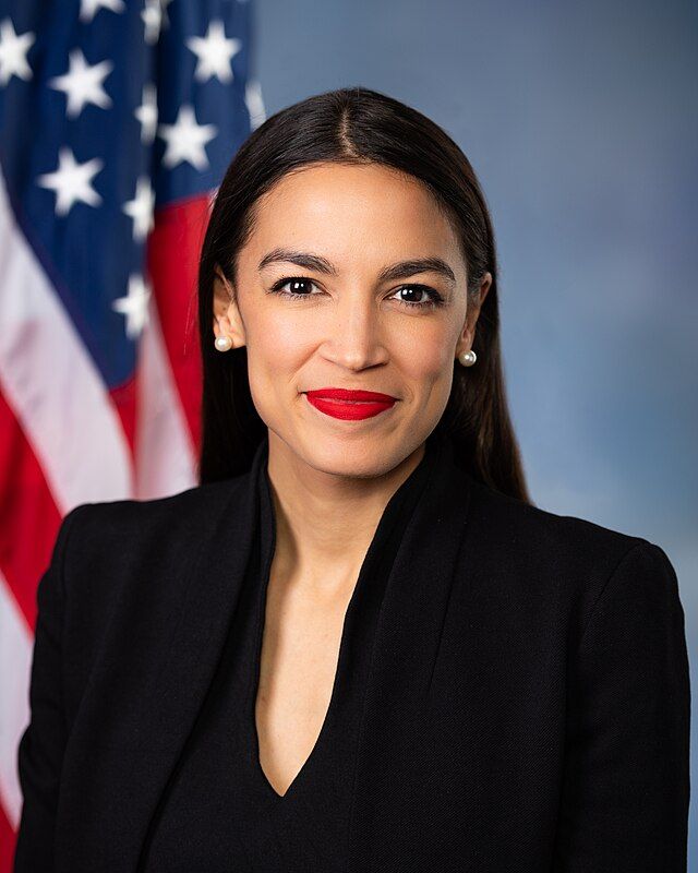 Kat Dennings as AOC
