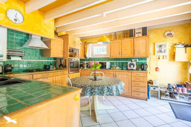 Change the yellow to white, a modern wood floor and a change the table