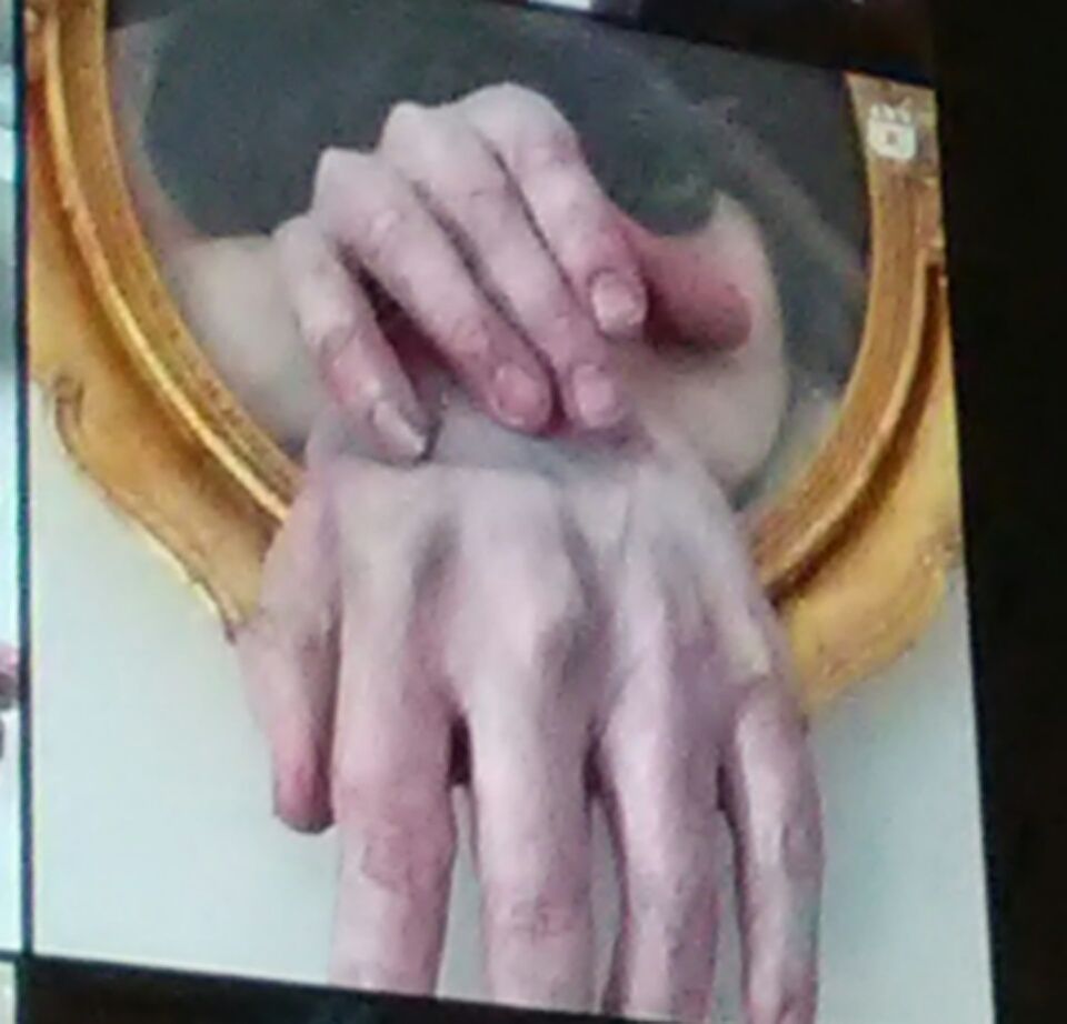 Dramatic surrealism. Mid shot. A pair of hands break out of a picture frame. Cinematic film still. Hyper detailed, intricate colors melt, ir...