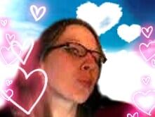 This exact same girl with purple hair and heavy black eye makeup, playfully blowing a kiss, in Bratz dolls style, porcelain skin 
By artist...