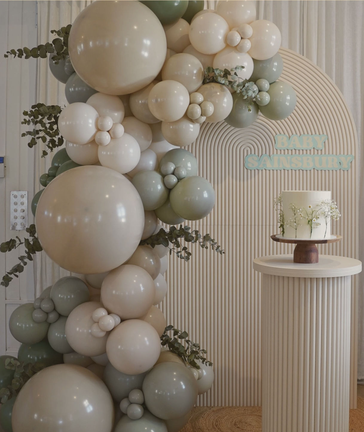 change the balloon colours to make it like a baby boy baby shower. Also remove the tiny balloons



