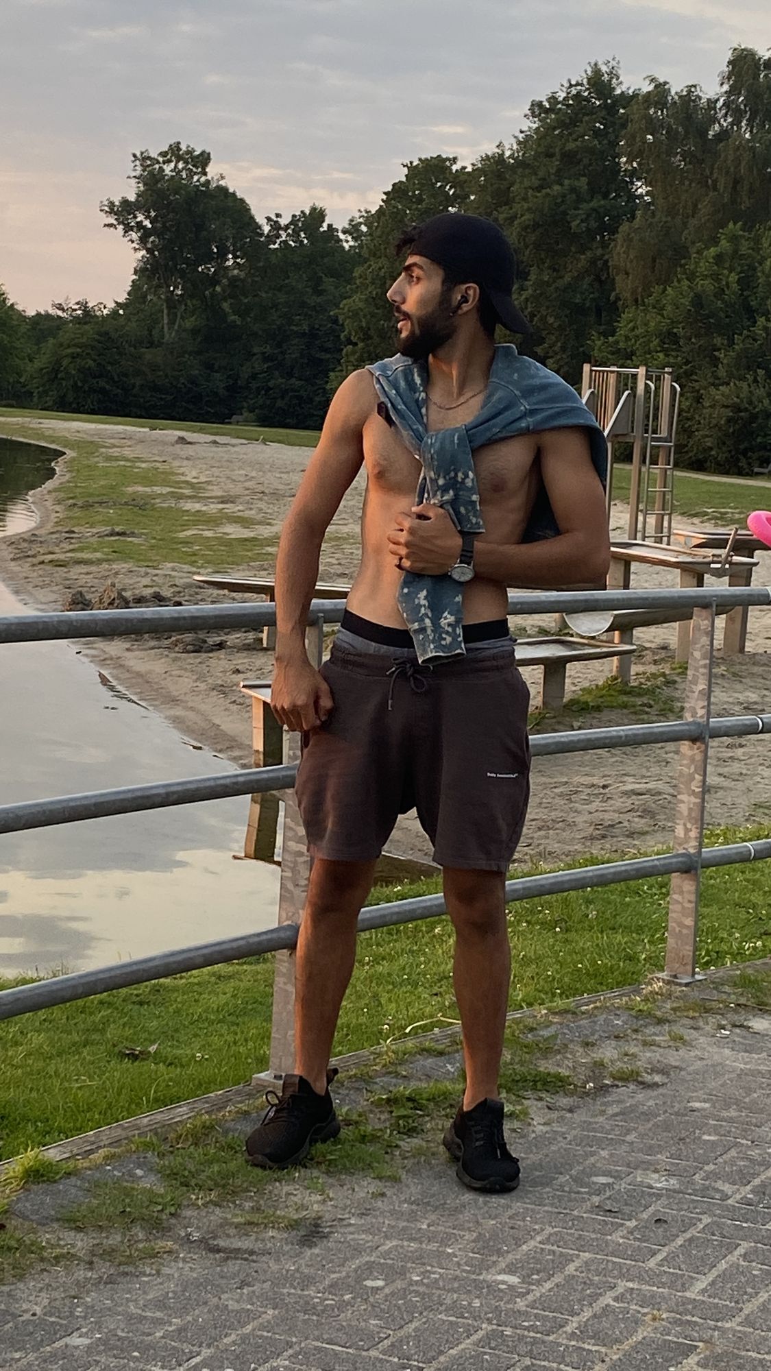 An anthropomorphic fox wearing a tuxedo at a dinner party.