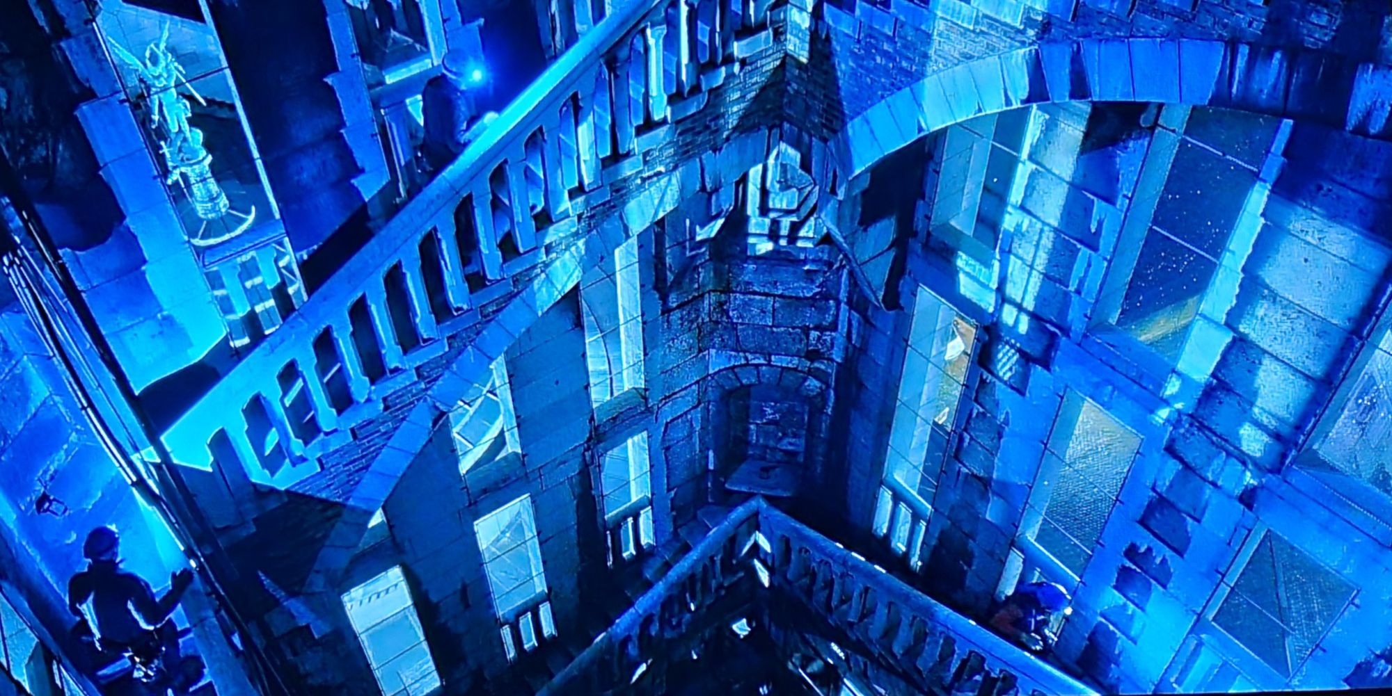 Escher style with many staircases with many woman in gold and blue azur.