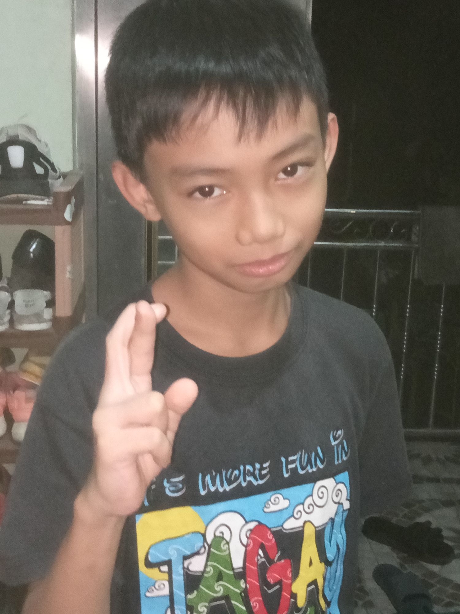 Prompt:"Create a digital illustration of a young Satoru Gojo from 'Jujutsu Kaisen.' He has silver-white, slightly longer and tousled hair, r...