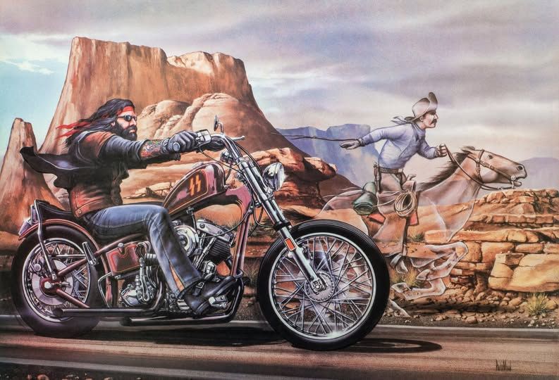A dynamic action photograph capturing a race side to side between two Ghost Riders on Route 66 at sunset. On the left, the first Ghost Rider...