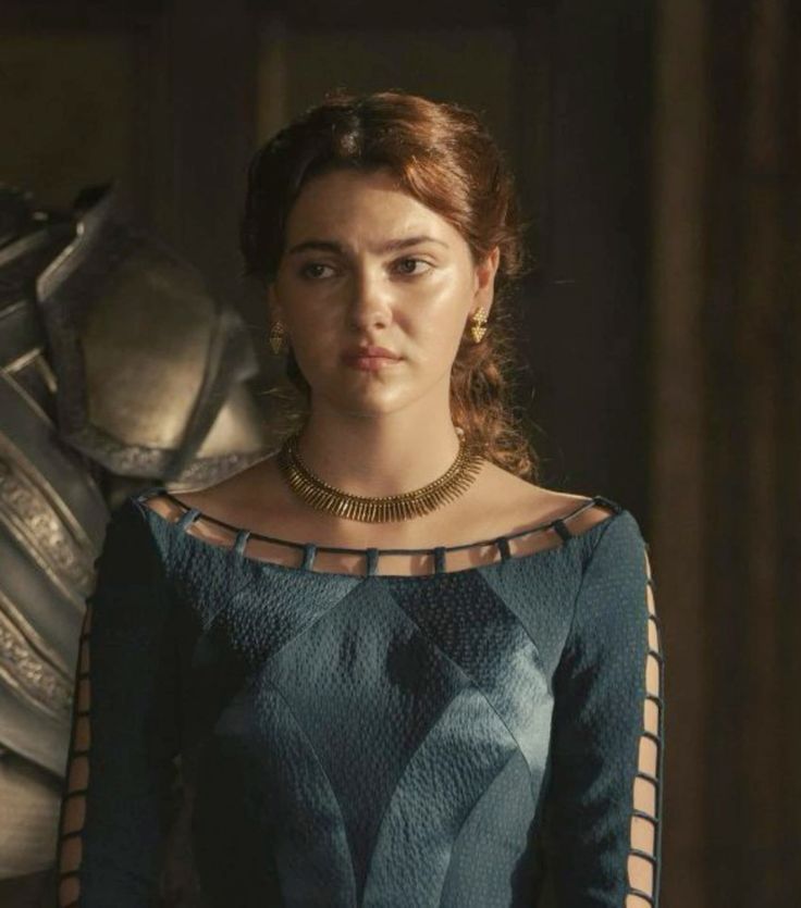 The series house of the dragon. A luxurious medieval princess bedroom where everything looks exquisite and beautiful. There is a beautiful p...