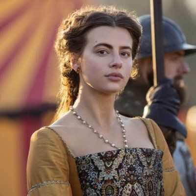 The series house of the dragon. A luxurious medieval room where everything looks luxurious and realistic. There is a beautiful lady here, sh...