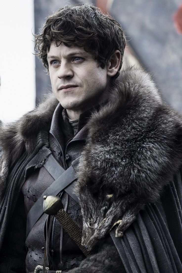 The series house of the dragon. The magnificent medieval courtyard of the castle, where everything is covered in snow. There is a young and...