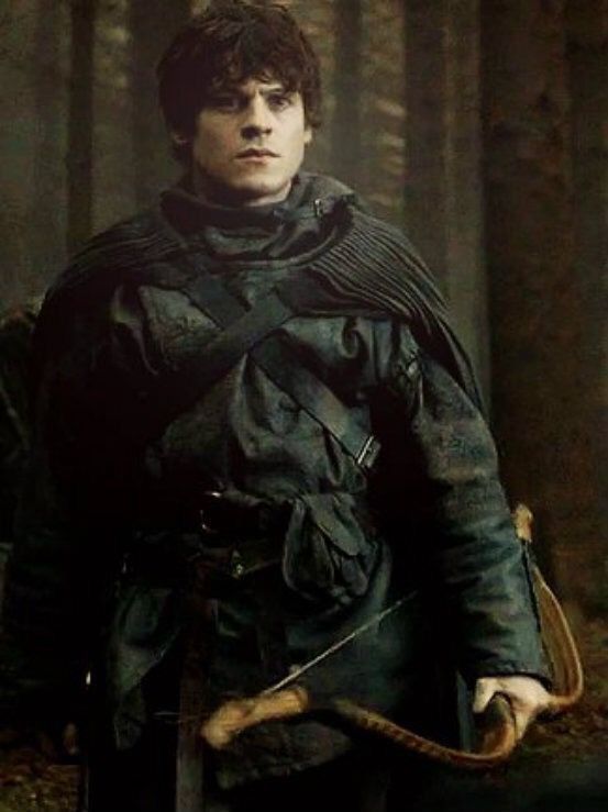 The series house of the dragon. The magnificent medieval courtyard of the castle, where everything is covered in snow. There is a young and...