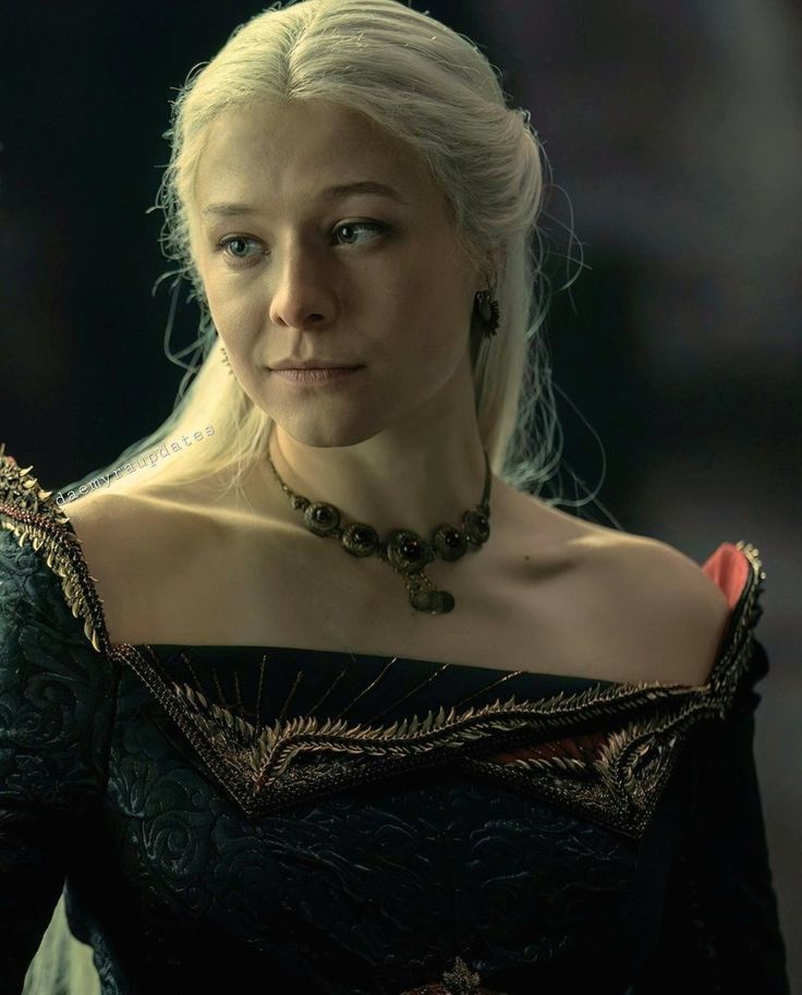 The series house of the dragon. A luxurious medieval throne room where everything looks exquisite and luxurious. There is a young queen in i...