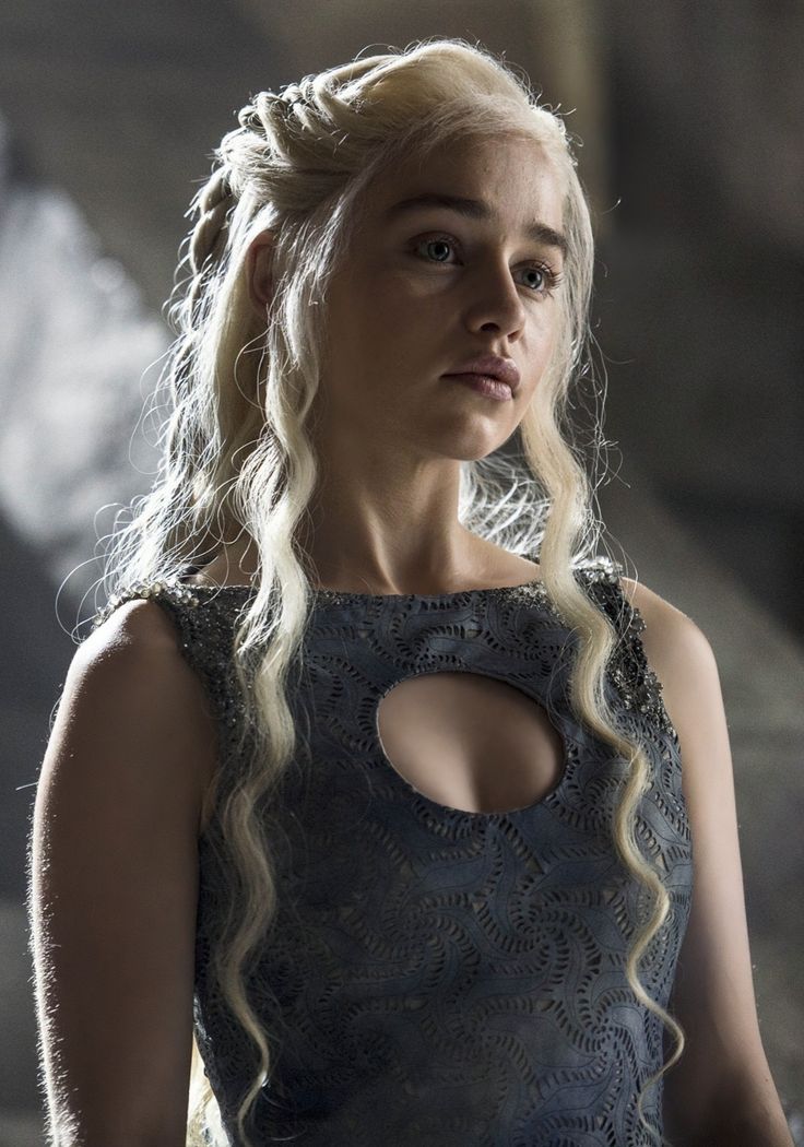 The series house of the dragon. A luxurious medieval balcony overlooking the stormy sky with lightning. There's a lady standing here. She ha...