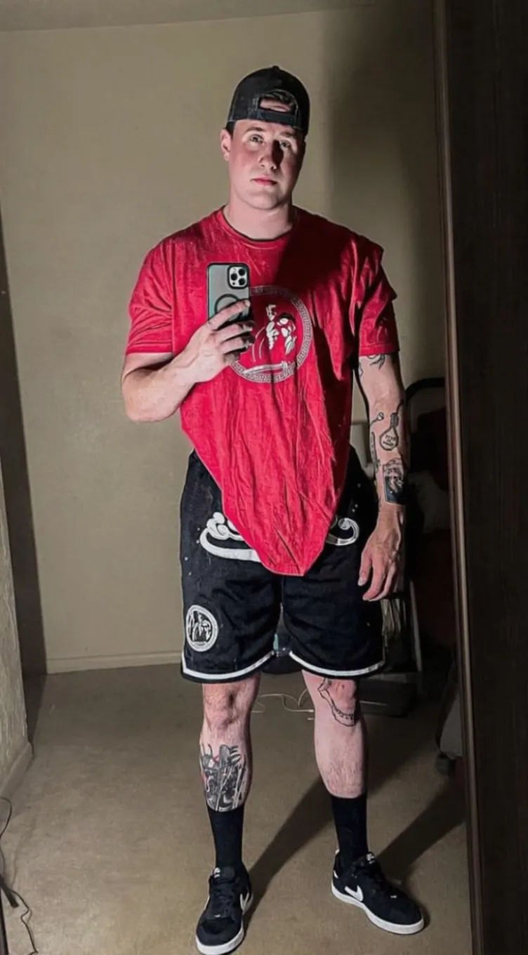 "Change the outfits to a white top, jeans, baseball cap, maintain the exact same character and facial features" hyperrealism out of frame be...